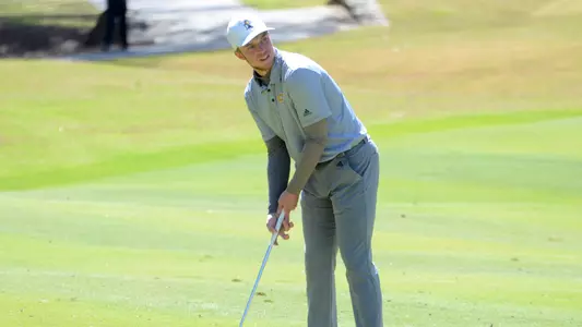Garrett Engle lines up from the fairway at the Linger Longer Invitational