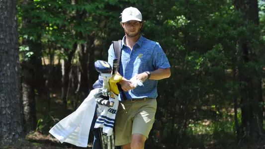 Braedon Wear heads off the tee towards a birdie in round 2 of the SoCon Championships