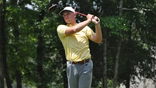 Garrett Engle poses in his finish with the driver at Auburn Regionals