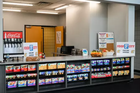 Food City and UTC representatives attend an event Thursday, May 25 in the Brenda Lawson Student-Athlete Success Center to announce that Food City will be funding a Fueling Station featuring healthy food options for athletes.