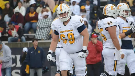 Lucas Lavin celebrates a big block in the win at ETSU