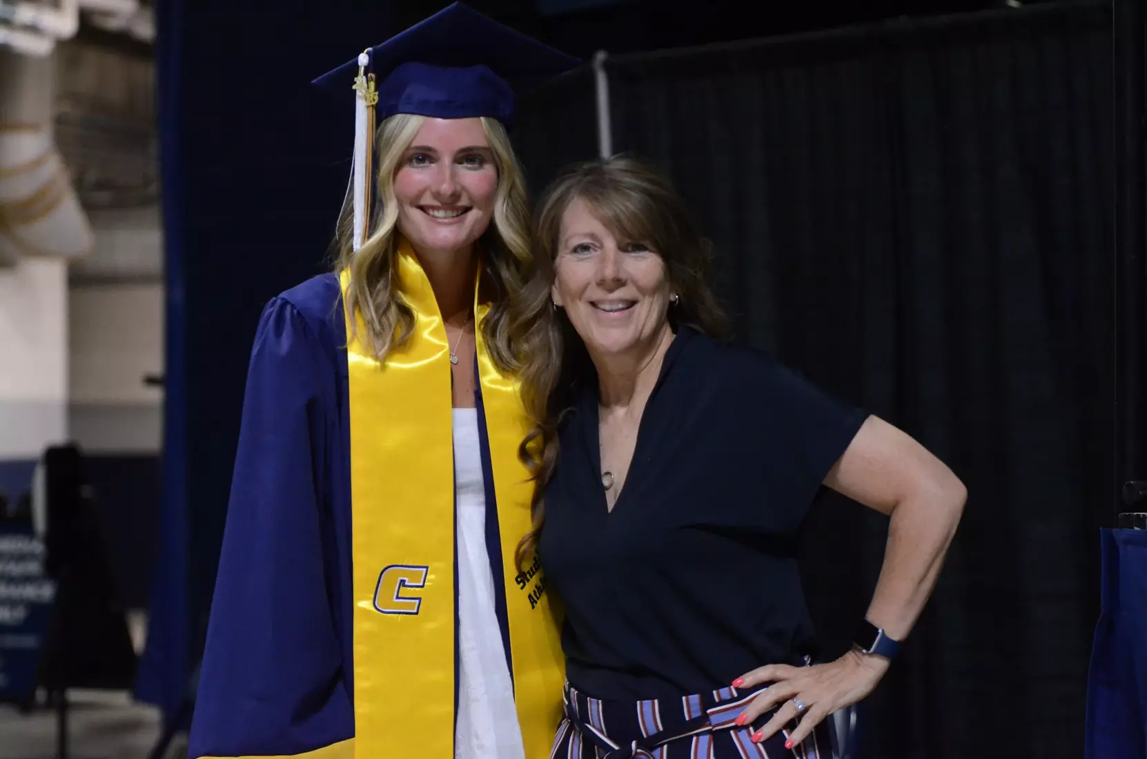Makenzie Jordan graduated with honors with a degree in Child & Family Studies on Friday. She is seen here with head coach Julie Torbett-Thomas.