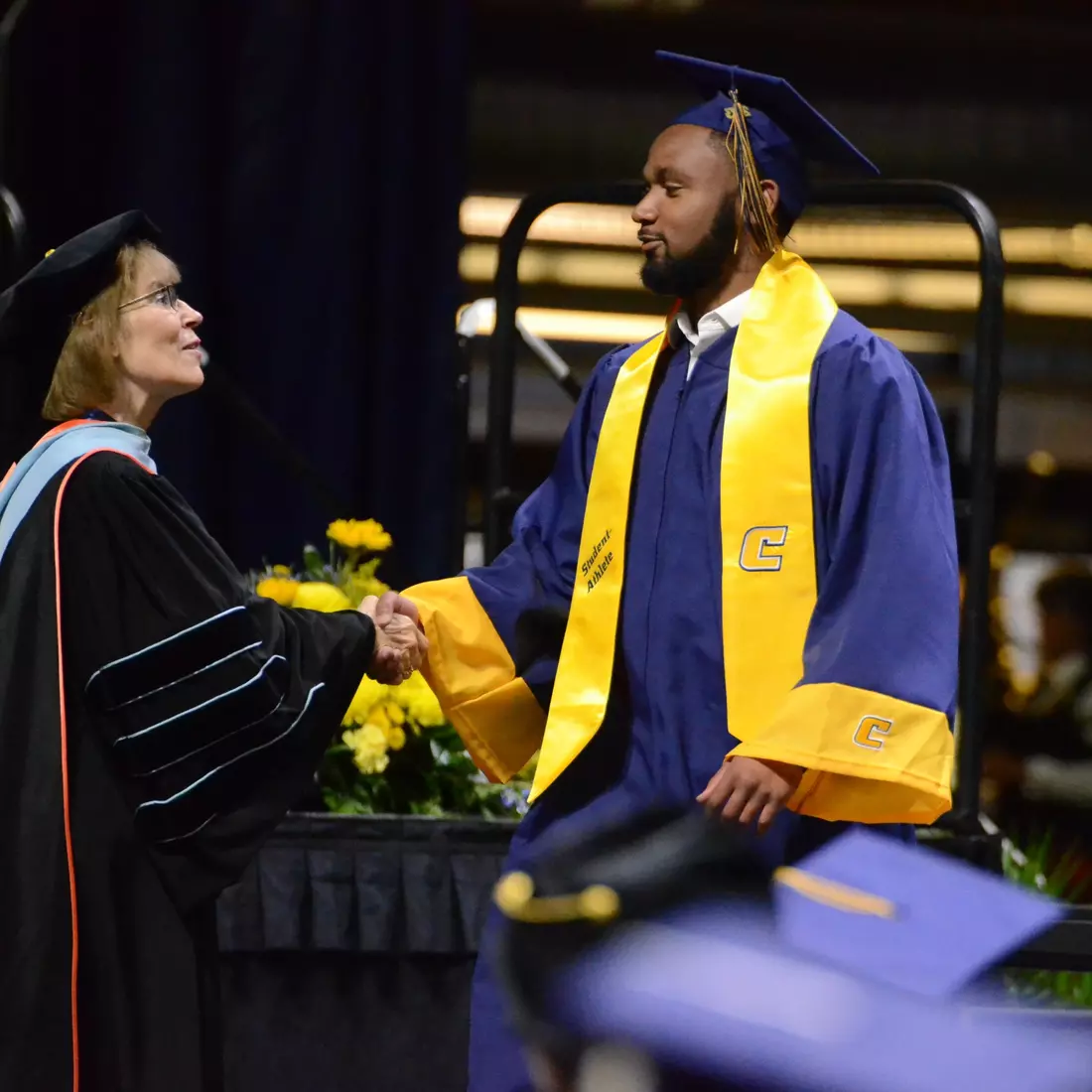 Football's Romeo Wykle eared a SORT Management degree this weekend.