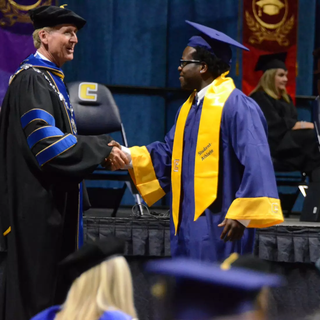 2022 All-American Ailym Ford with Dr. Angle after earning his degree in SORT Management.