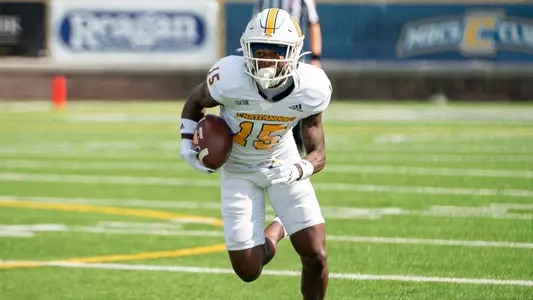Kam Brown runs for the end zone during his 1st quarter pick 6 two plays into the Mercer game