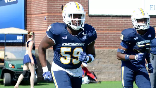 Deovion Davis goes through pregame drills for the win over VMI
