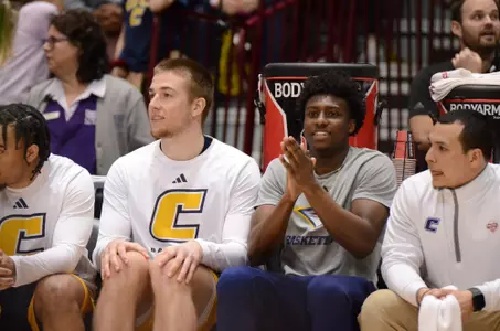 Honor Huff cheering on teammates in SoCon tourney win over Samford
