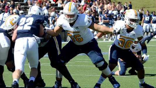 Jeremiah Katt blocks for another PAT in the road romp at Samford