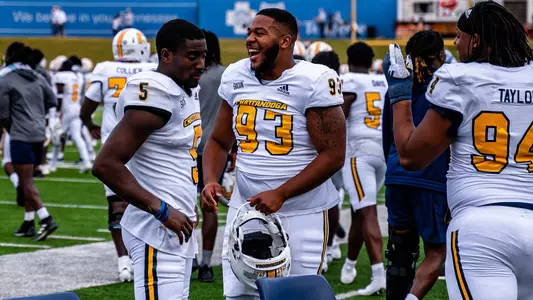 Kelvin Morris enjoys a moment on the sidelines in the win over Mercer