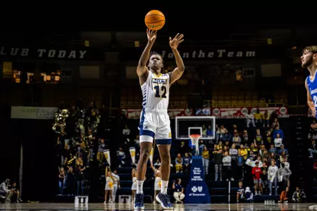 Johnny Taylor Jr. shooting free throw against Covenant