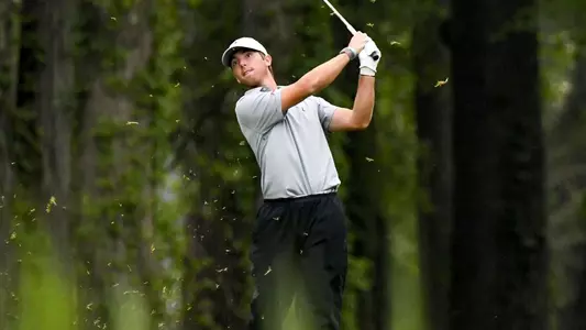 Dalton Chuba follows through on a shot at Lee