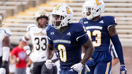 Ailym Ford heads back to the huddle ready for another big gain against Wofford