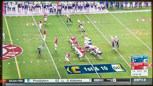 Photo of TV screen featuring Mocs 3-0 1st quarter lead at Alabama in 2016
