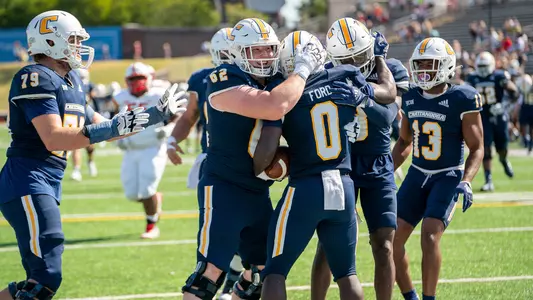 Offense celebrates another Ailym Ford touchdown