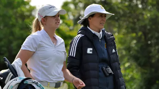 Coach Colette Murray and Kera Healey discuss tee shot at SoCon Championships