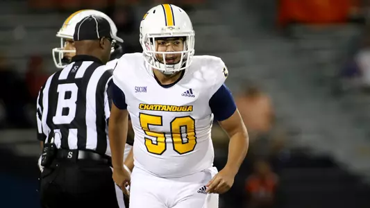 Cody Olszewski leaves the field after downing a punt on the Illinois 1-yard line