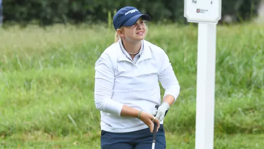 Kera Healey admires her tee shot at the 2022 Mason Rudolph Championships