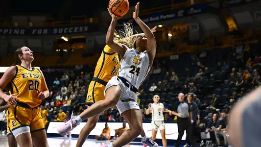 Jada Guinn gets an and-1 bucket on a strong drive in the win over ETSU.