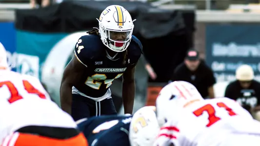 Josh Battle looks intently into the backfield awaiting the next snap against Mercer