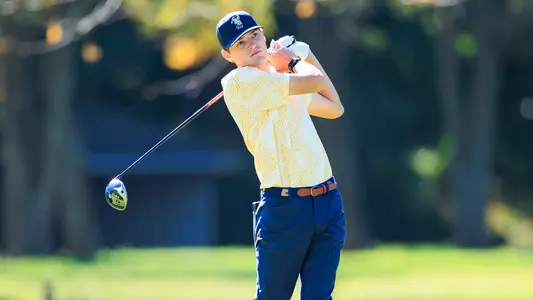 Carson Johnson watches his drive from the tee at UK