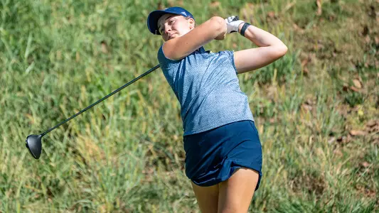 Makenzie Cooper finishes her swing and watched her drive find the fairway at Vandy