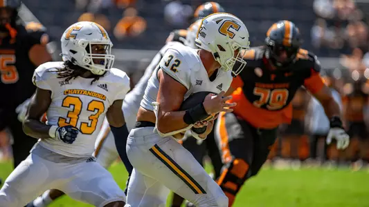 Kobe Joseph is close to the end of his 71-yard interception return as tacklers approach at Tennessee