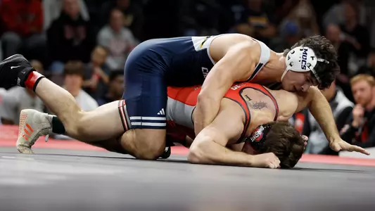 Kamdyn Munro works on top in a tight loss at Ohio State
