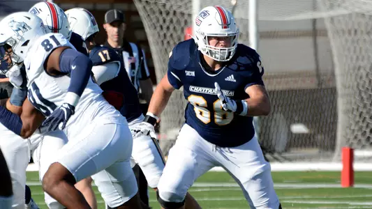 Bryce Goodner looks to attack his block on a run against Samford