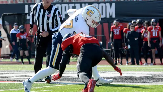 Jay Gibson runs over a tackler at Austin Peay