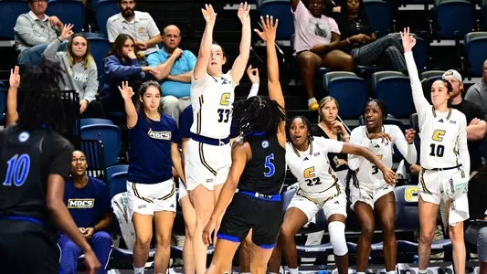 Karsen Murphy gets the bench lit launching a three in the win over Shorter