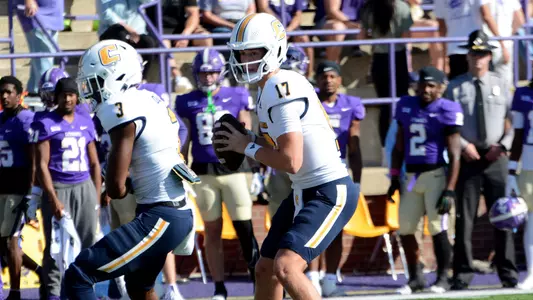 Luke Schomburg surveys the defense as he receives the shotgun snap at Western Carolina