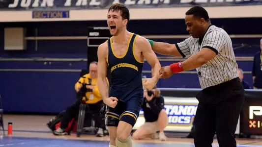 Blake Boarman celebrates a pin over App State