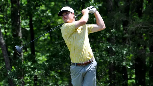 John Houk completes his drive at the NCAA Auburn Regionals