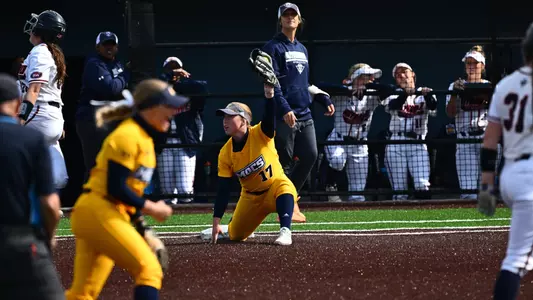 Kendall Forsythe makes catch at first for double play