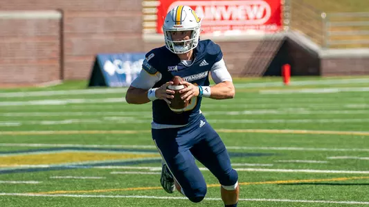 Chase Artopoeus rolls in space with pass-run option in the open field in the win over ETSU