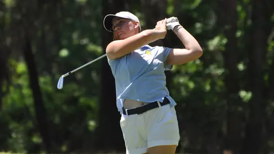 Makenzie Cooper holds her pose following her iron shot on SoCon Tournament Day 1