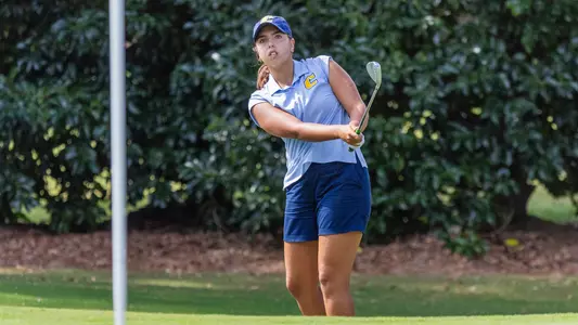 Giulia Foresta holds her pose tracking her chip shot at Old Dominion