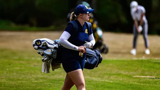 Kera Healey walks with her bag to her next shot at the Chattanooga Classic