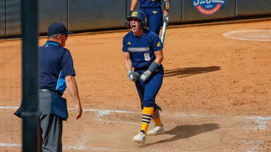 Kaili Phillips scores a run in the SoCon Championship game