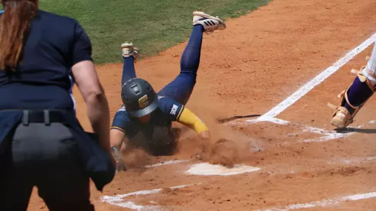 Addy Keylon slides home