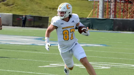 Jay Gibson runs to set up a 1st & goal at Samford