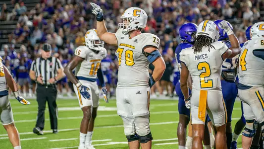 Tackle Dave Monnot III signals a first down for the Chattanooga Mocs