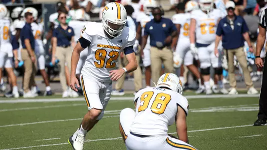 Kicker Jude Kelley makes his approach in a successful field goal attempt at Samford