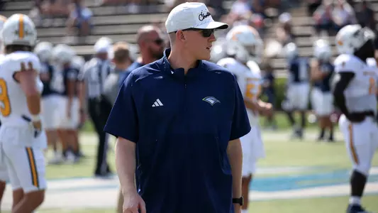Zeb Speir surveys pregame work prior to the 2023 win at Samford