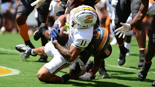 Sam Phillips collects one of his five catches in the 2024 opener at Tennessee