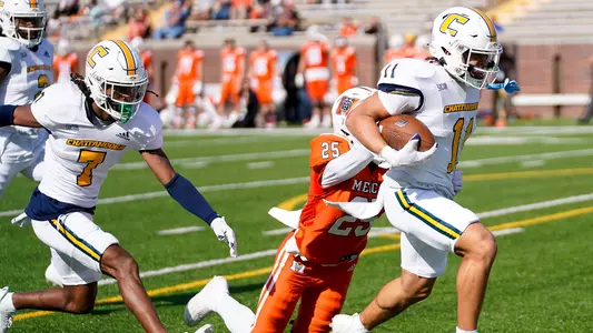 Sam Phillips drags a Mercer tackler the final few yards into the end zone for his first career score in 2022
