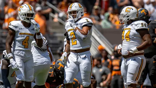 Defensive back Jordan Walker, linebacker Alex Mitchell & defensive tackle Marlon Taylor get into position after stopping Tennessee to short yardage in 2024