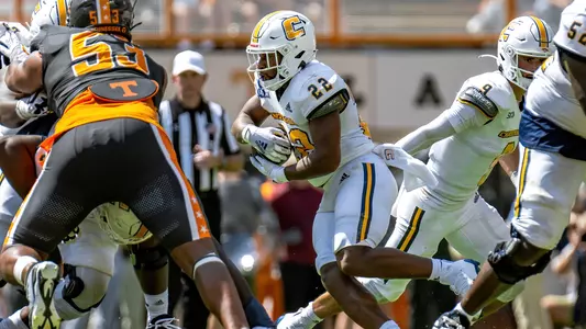Lance Jackson darts through the hole in the Tennessee defense created by his o-line