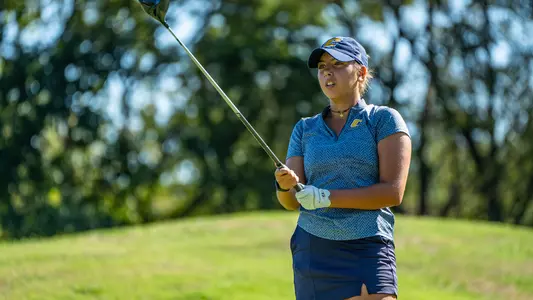 Giulia Foresta lines up her tee shot using her driver as a targeting tool during the first round at Vandy
