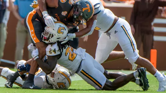 Josh Battle wraps up the Tennessee ball carrier in action during the 2024 meeting